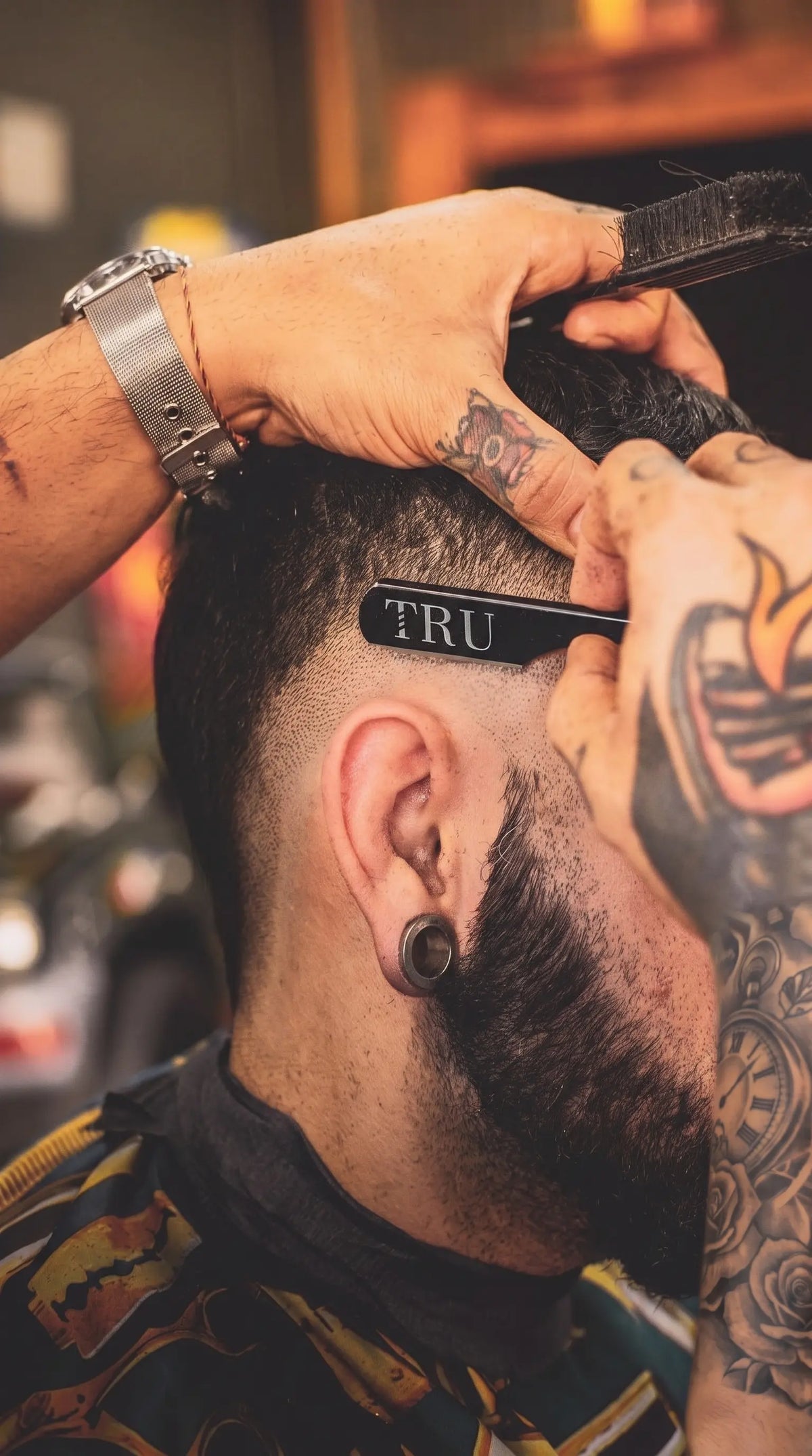 Audífonos con cámara POV para barberos